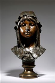 Auguste Bija, A 20thC Continental cast bronze bust depicting a young Dutch  woman in a cloth cap, after Augusts Bija (1872-1957). Signed BIJA verso.  Approx. 16 3/4 high overall