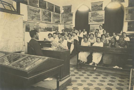 Classrooms, pupils during various activities and teachers in Herzliya Hebrew Gymnasium, from its early days in the historic building in Tel-Aviv