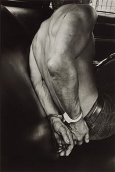 Suspect in the back of a police car, New York City Picture