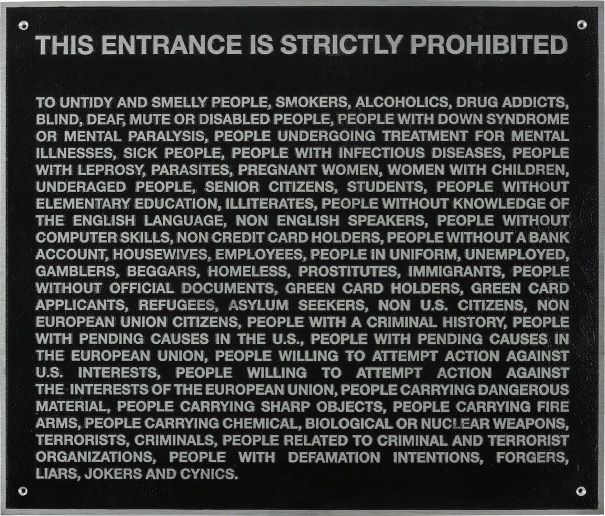 Artwork by Santiago Sierra, Door Plate, Made of Cast aluminium relief sign with black enamel paint and a hole at each corner.