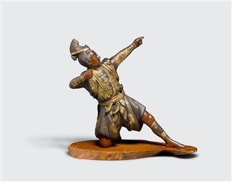 A gilt bronze figure of an archer - Shosei