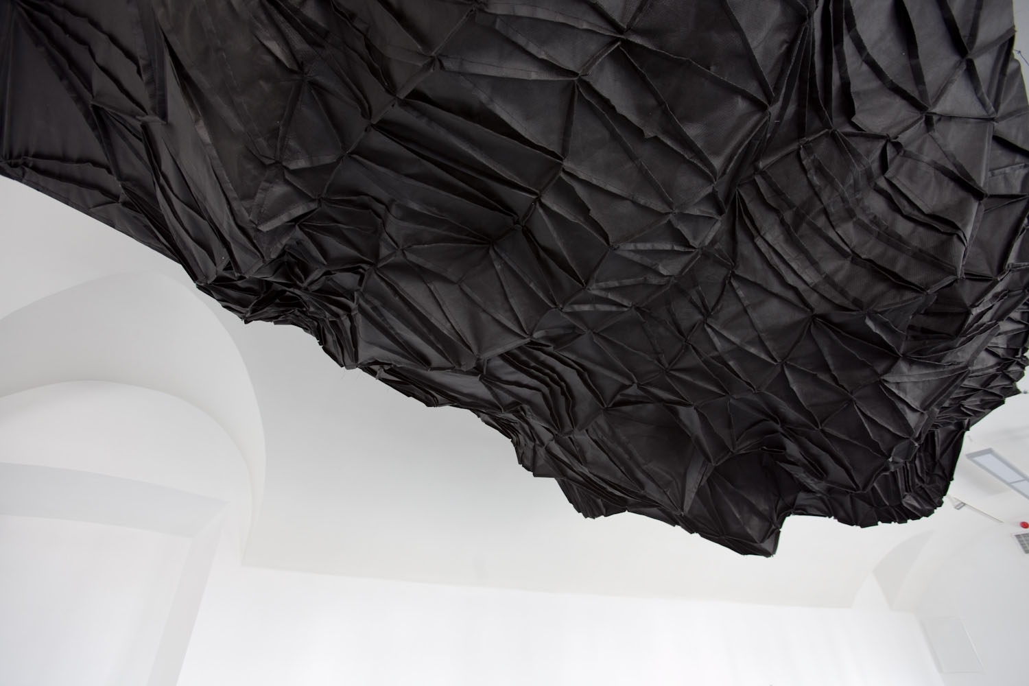 Artwork by Aleksandra Wasilkowska, Black Island - prototype scenography design for the spectacle 'The Sexual Life of Savages', Made of installation