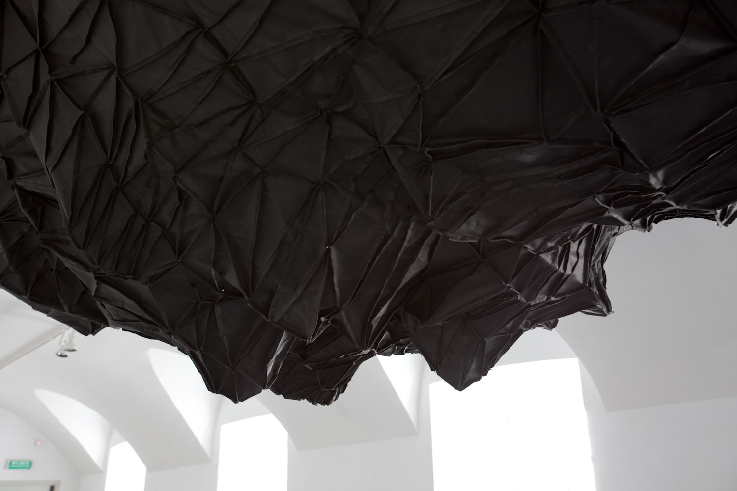 Artwork by Aleksandra Wasilkowska, Black Island - prototype scenography design for the spectacle 'The Sexual Life of Savages', Made of installation