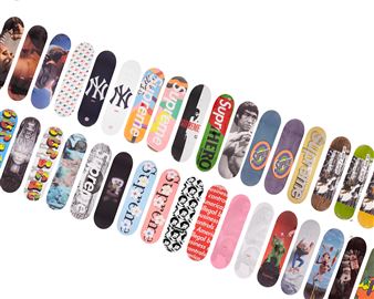 A complete group of 131 full-sized Supreme skateboard decks - Supreme