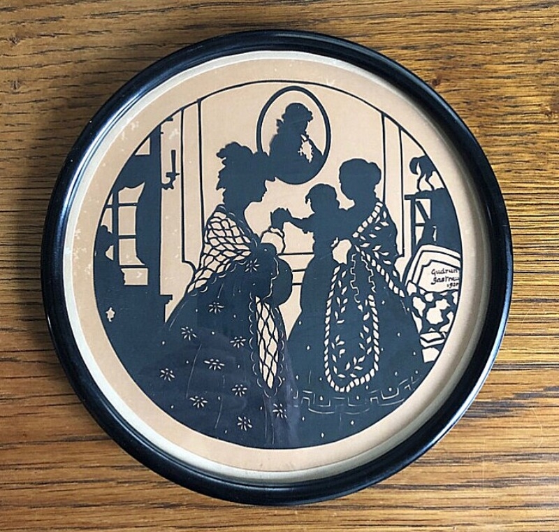 Artwork by Gudrun Harboesgaard, Silhouette of women and child, Made of Frame