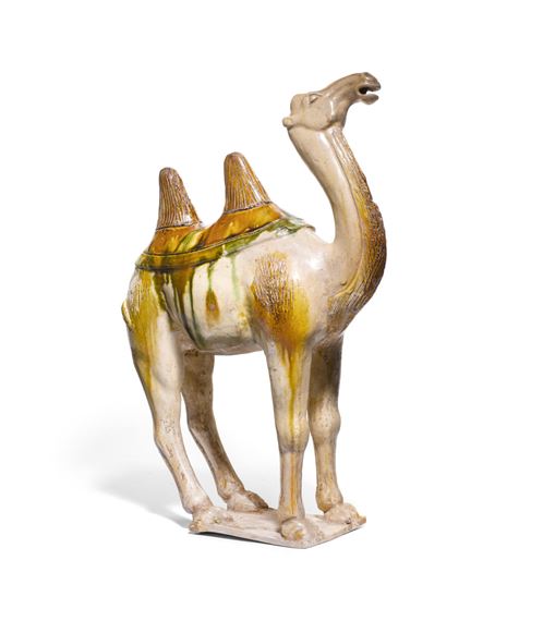 A sancai glazed pottery figure of a camel by Chinese School