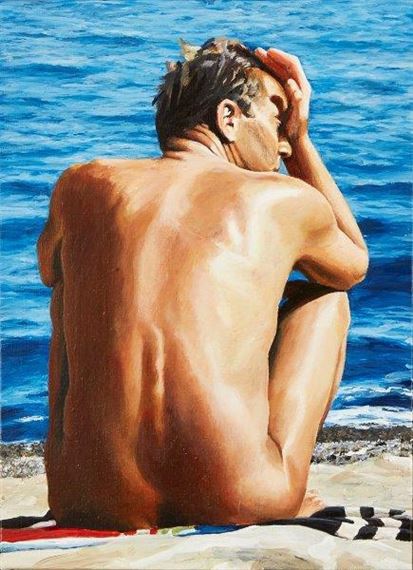 A figure sits on a beach, back to the viewer, gazing at the ocean.
