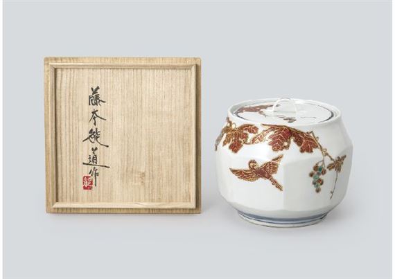 Water container depicting small bird and grape in overglaze enamel