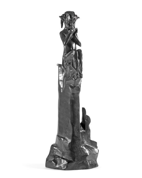 A patinated bronze model of a seated pixie by Charlotte H. Monginot