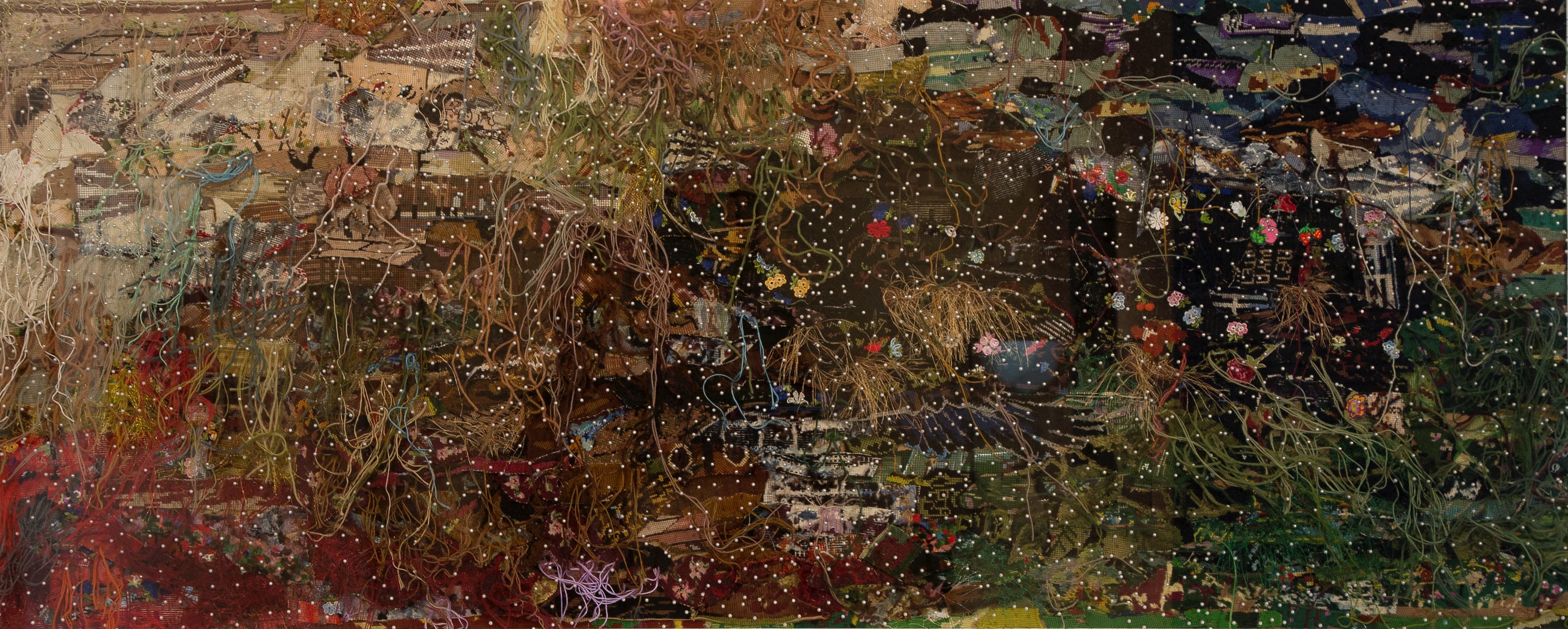 A chaotic, textured landscape of tangled roots and scattered debris.