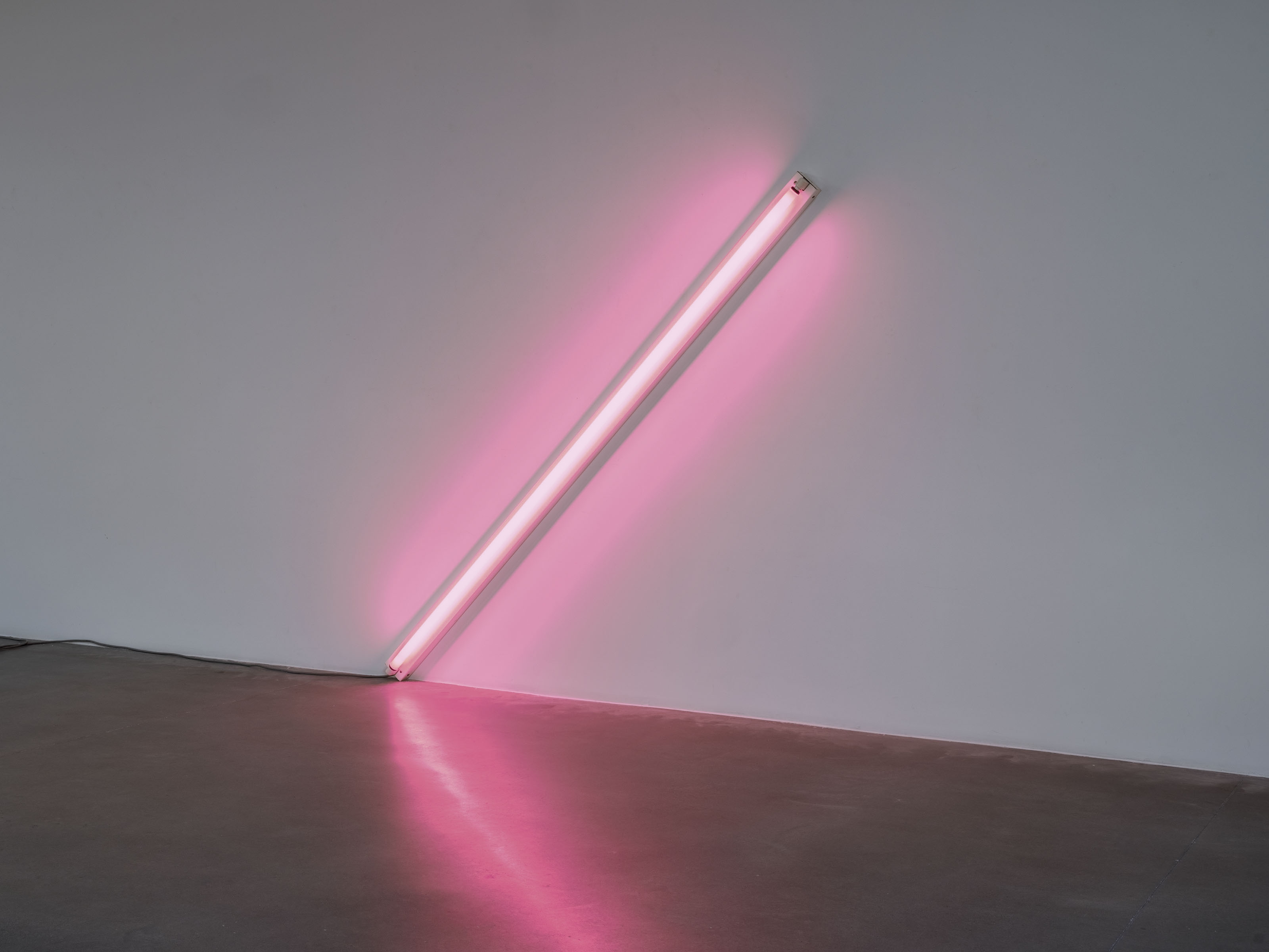 Artwork by Dan Flavin, the diagonal of May 25, Made of pink fluorescent light
