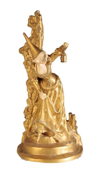 A GILT BRONZE AND IVORY SCULPTURE by Charlotte H. Monginot
