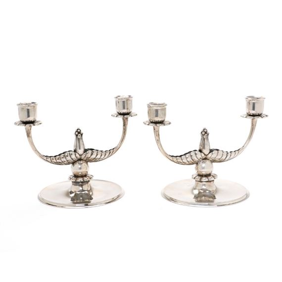 A pair of two-arm silver candelabrum by Grann & Laglye, 1931