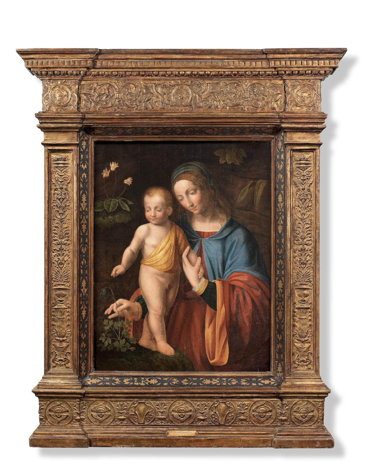 Bernardino Luini | The Virgin with Child holding a branch of lilies ...