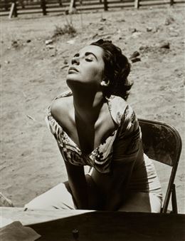 Elizabeth Taylor Sunning Herself on the Set of "Giant" - Sid Avery