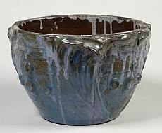 Un cache-pot en grès à décor by Arthur Craco