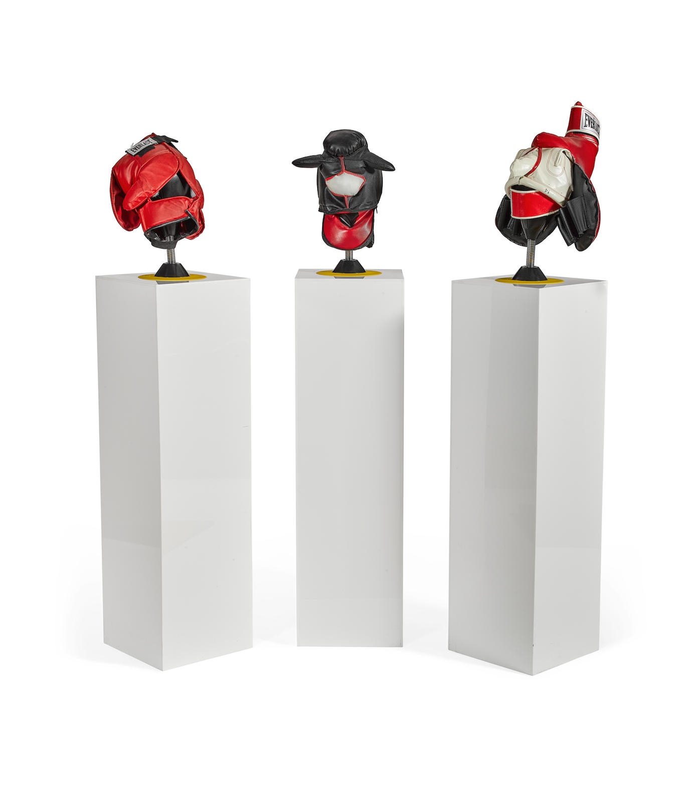 Artwork by Brian Jungen, Dummies, Made of leather Everlast boxing gloves on speed bags, in three parts