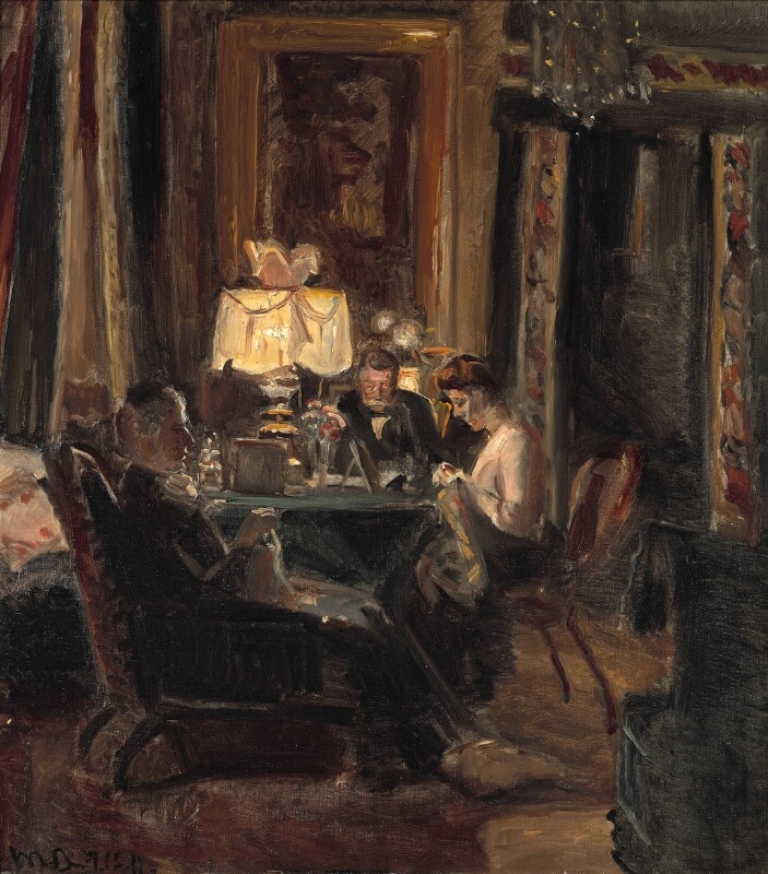Interior from the livingroom at Kruuseminde with the Bech family at a table in lamp light by Michael Peter Ancher, painted in 1911