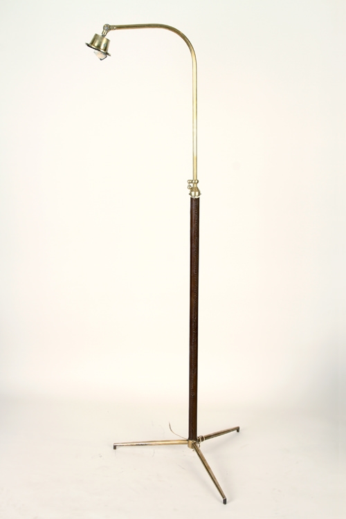 Jacques Adnet  A bronze adjustable floor lamp having stitched