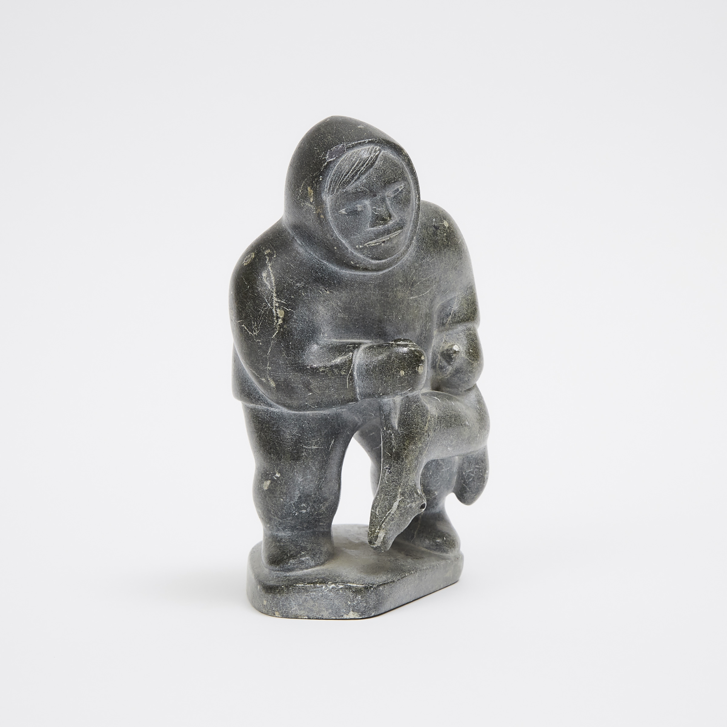 Artwork by Maggie Sheeguapik, HUNTER WITH FOX, Made of stone