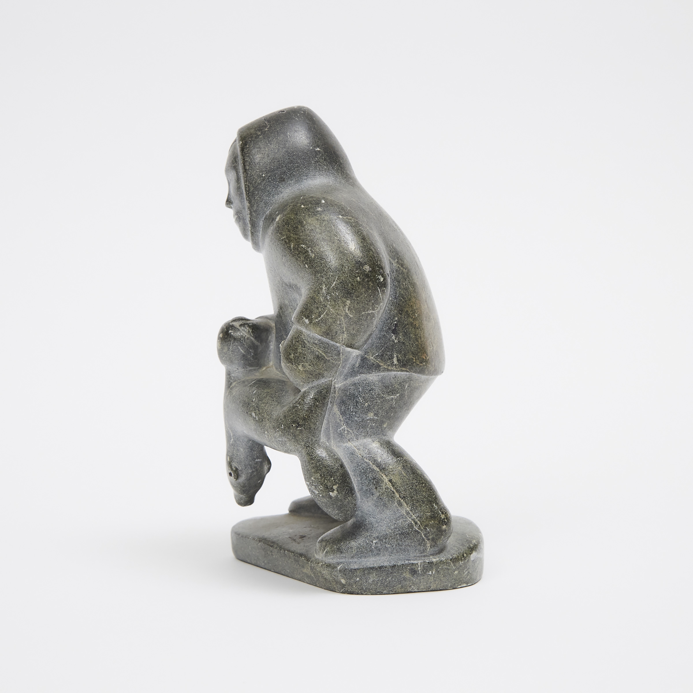 Artwork by Maggie Sheeguapik, HUNTER WITH FOX, Made of stone