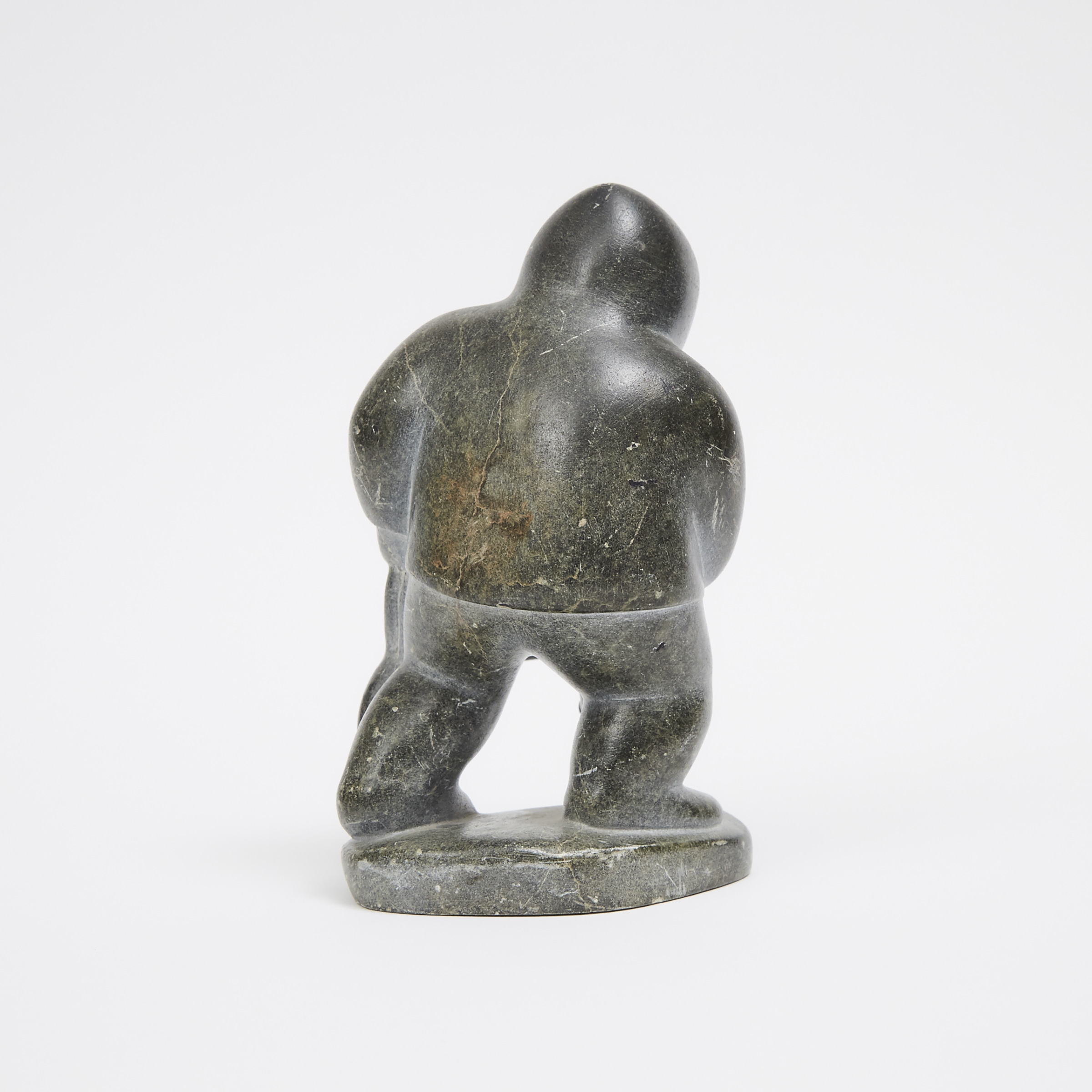 Artwork by Maggie Sheeguapik, HUNTER WITH FOX, Made of stone