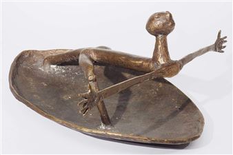 A bronze sculpture of a reclining figure in a boat-like vessel.