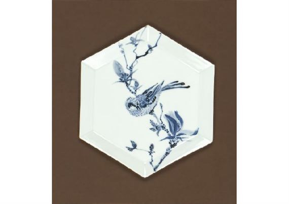 Blue and white porcelain plate depicting magnolia and bulbul