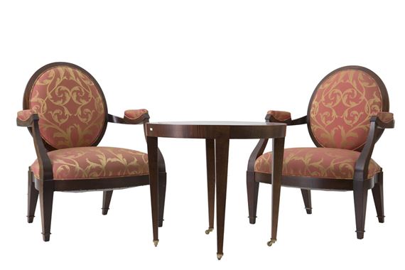 Three-piece Donghia salon suite comprising a coffee table and a pair of armchairs with medallion back by Angelo Donghia