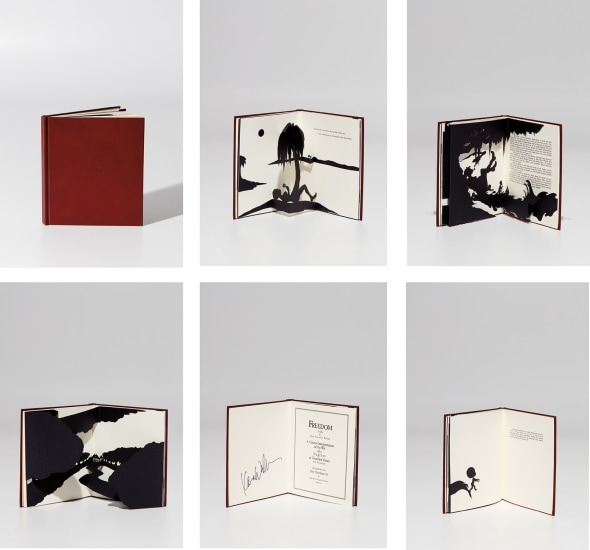 Artwork by Kara Walker, Freedom, A Fable, Made of Laser-cut paper pop-up book, bound in brown leather (as issued), with the accompanying Norton family Christmas card, lacking the original packing box.