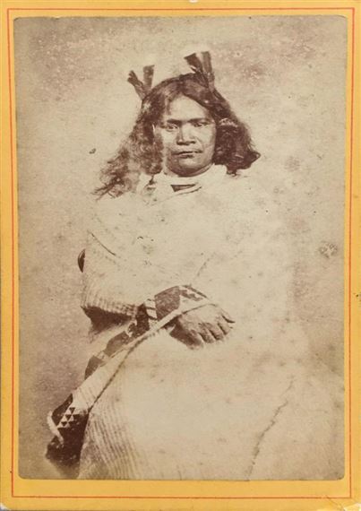 Untitled (Seated Māori woman with 4 huia feathers) by Henry Lock, ca 1880
