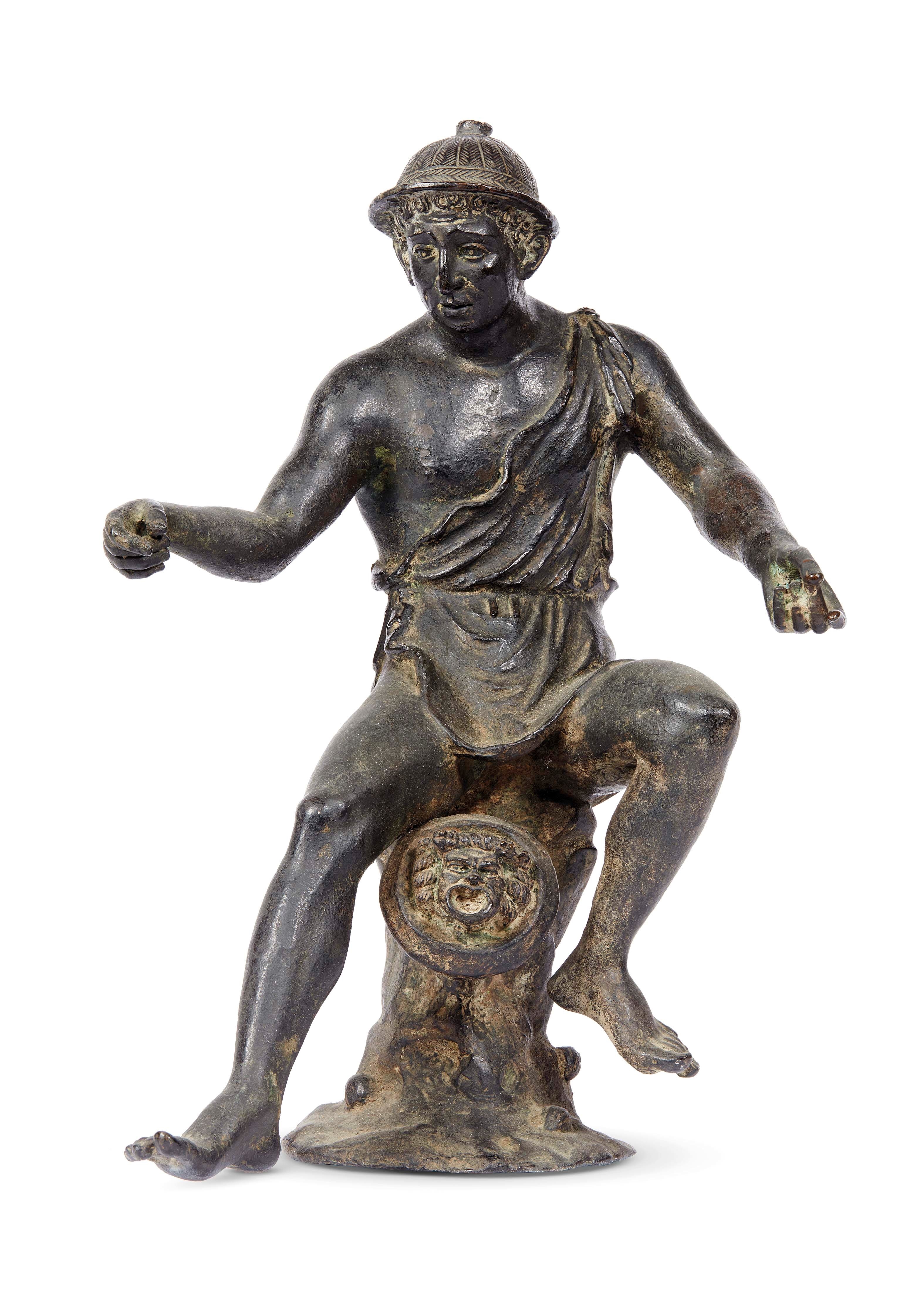 A bronze figure of Narcissus and the Venus Calipigia by Anonymous