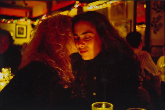 Lynette and Donna at Marion's Restaurant, NYC. by Nan Goldin, 1991