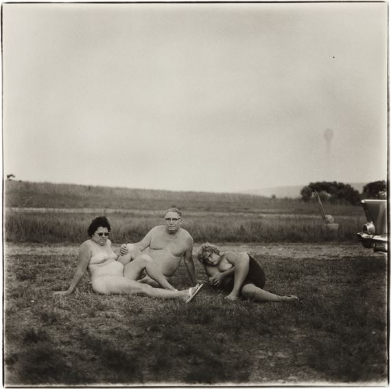'A FAMILY ONE EVENING IN A NUDIST CAMP, PA' by Diane Arbus, 1965