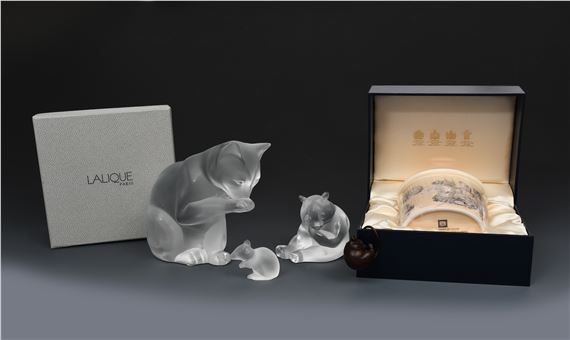 A modern Lalique clear and frosted glass model of a seated panda
