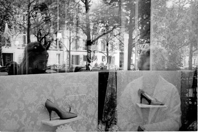 Marc Bohan behind the window of the Boutique Dior, Avenue Montaigne, Paris by Giancarlo Botti, 1960