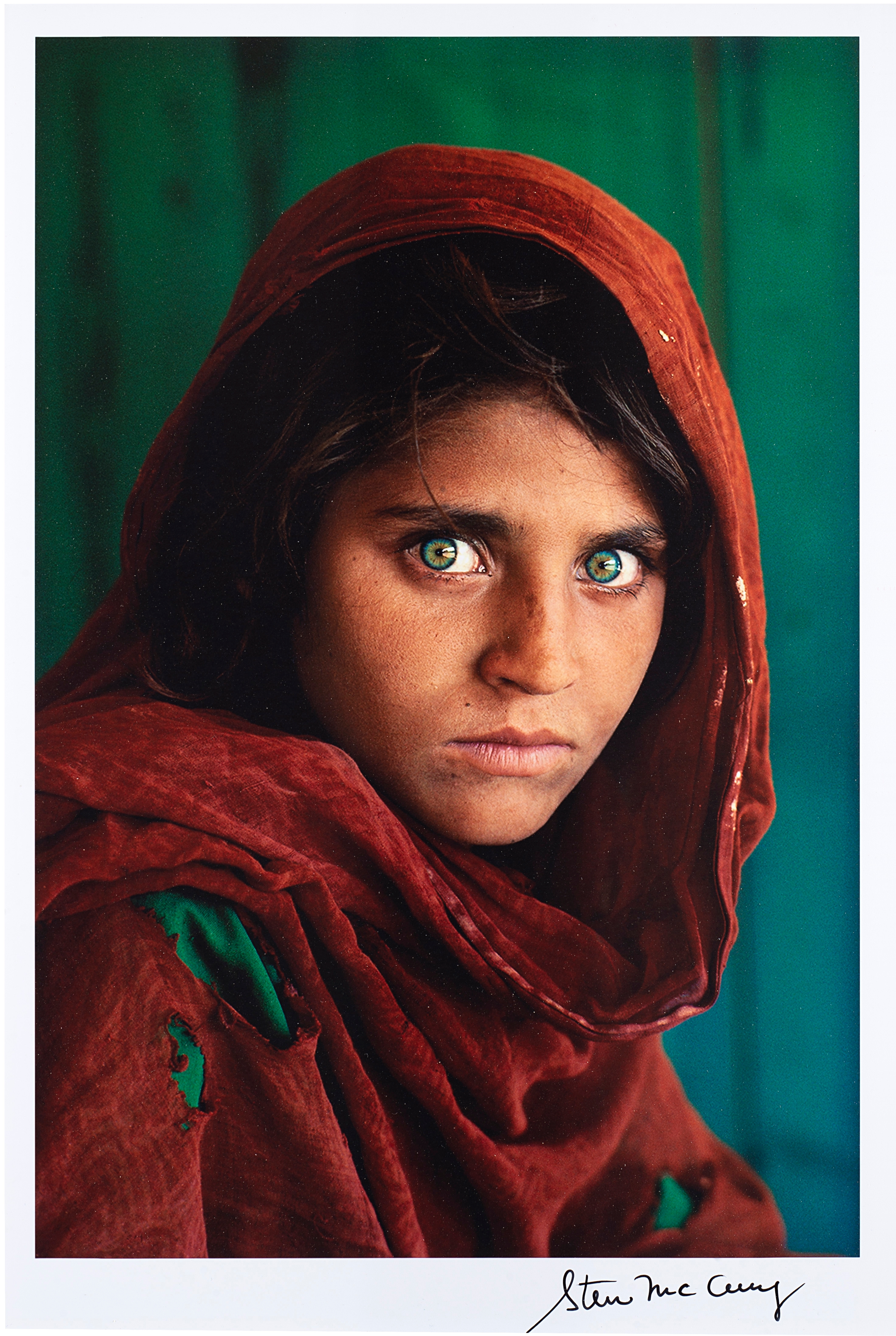 Afghan Girl, Sharbat Gula, Peshawar, Pakistan by Steve McCurry, 1984, printed later