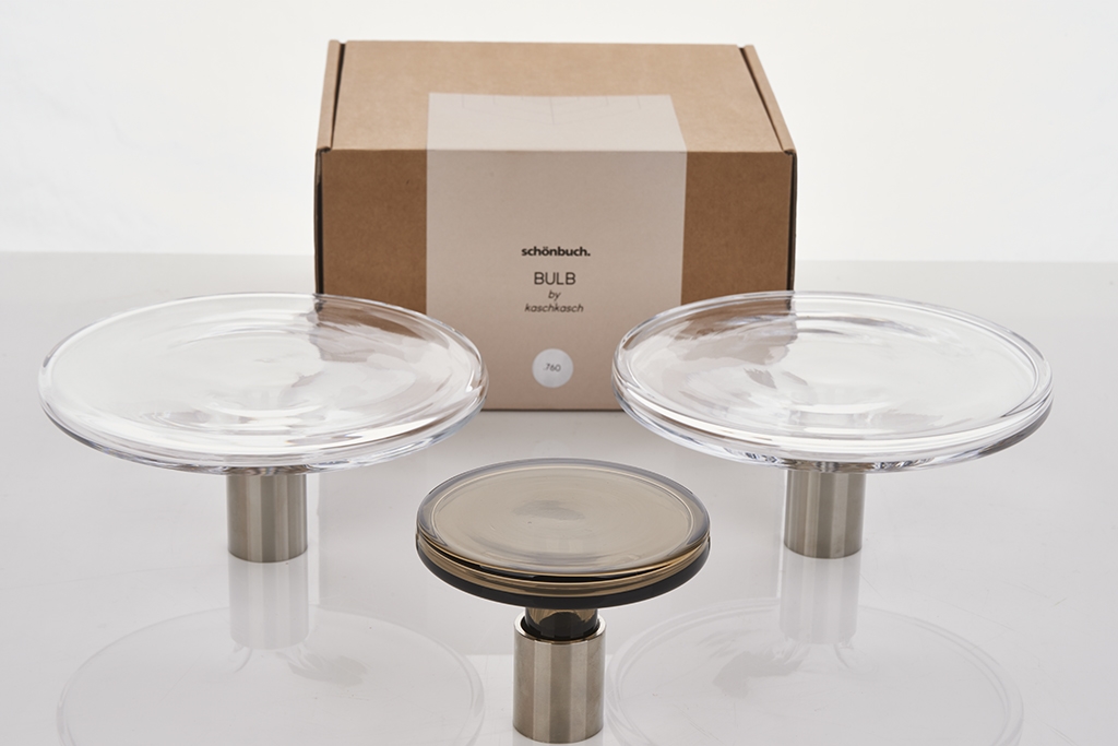 Artwork by Florian Kallus And Sebastian Schneider, Three 'Bulb' Wall Hooks, Made of two in clear glass, one in smoked glass, stainless steel (3)