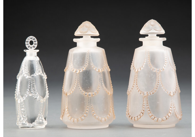 Glass Perles Perfume Bottles and a Glass Palerme Perfume Bottle by René Lalique, circa 1926