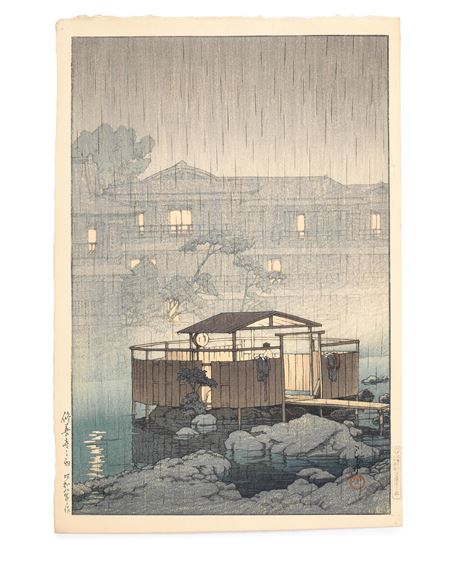 An oban tate-e print, titled on the left margin Shuzenji no ame (Rain at Shuzenji) by Hasui Kawase, dated 1933