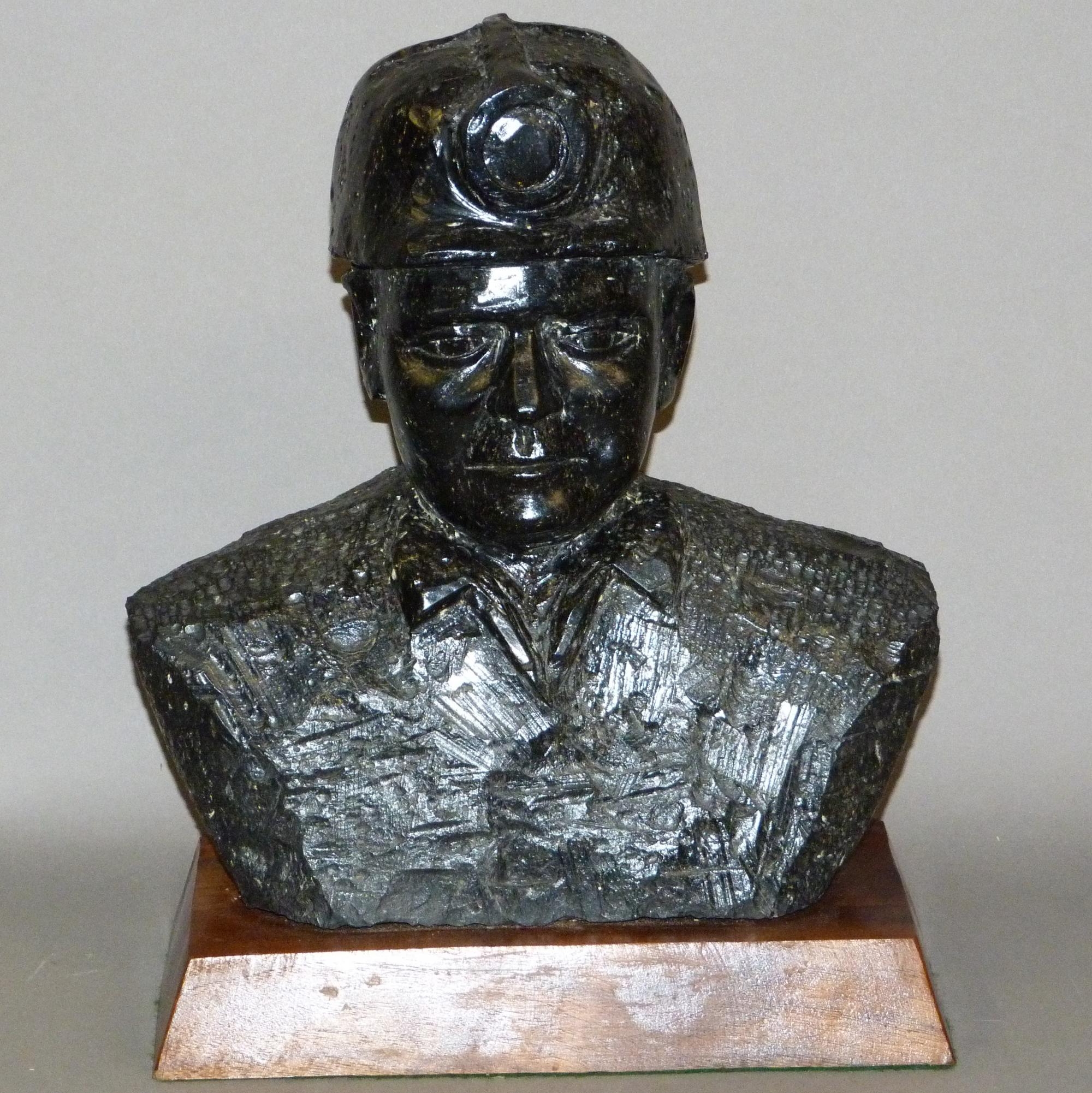 James Stewart Head and shoulders sculpture of a miner with helmet