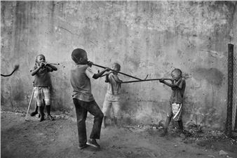 Kids playing with plastic pipes (from the Place of Peace series) - Lindokuhle Sobekwa