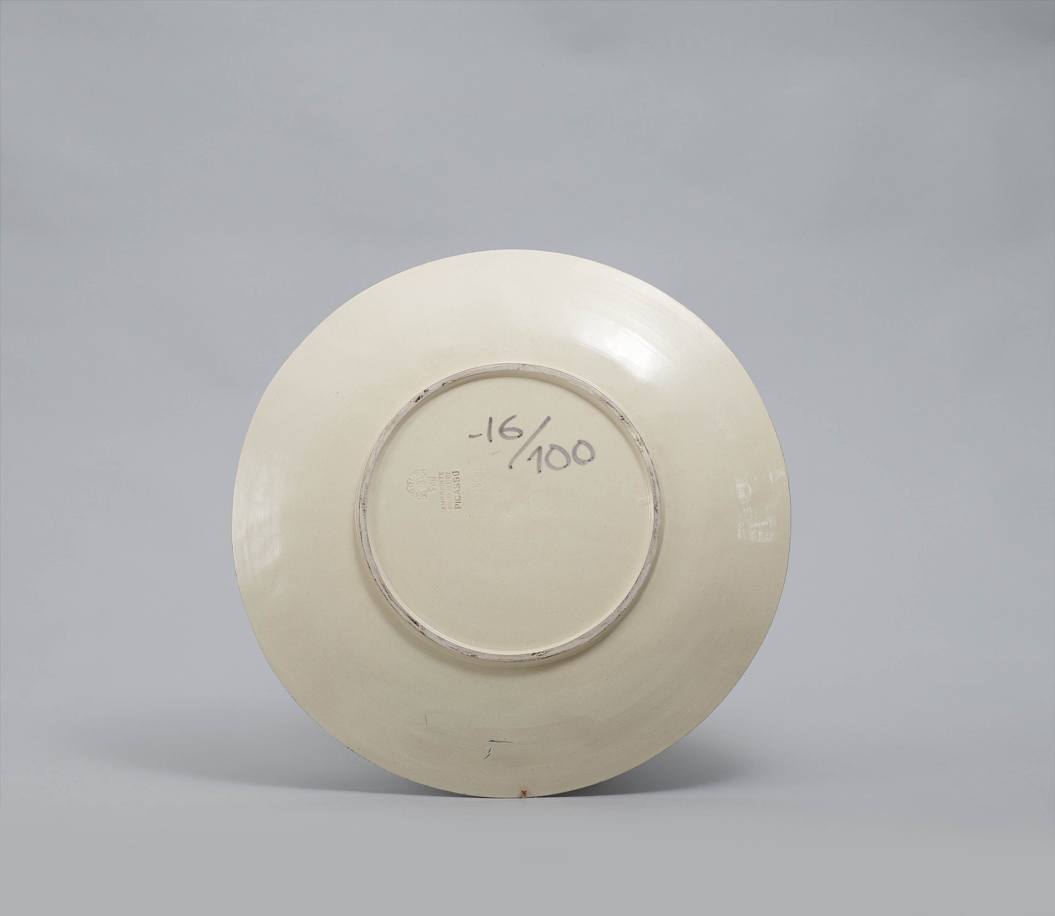 Artwork by Pablo Picasso, Face with grid., Made of White earthenware, partially polychromed and glazed