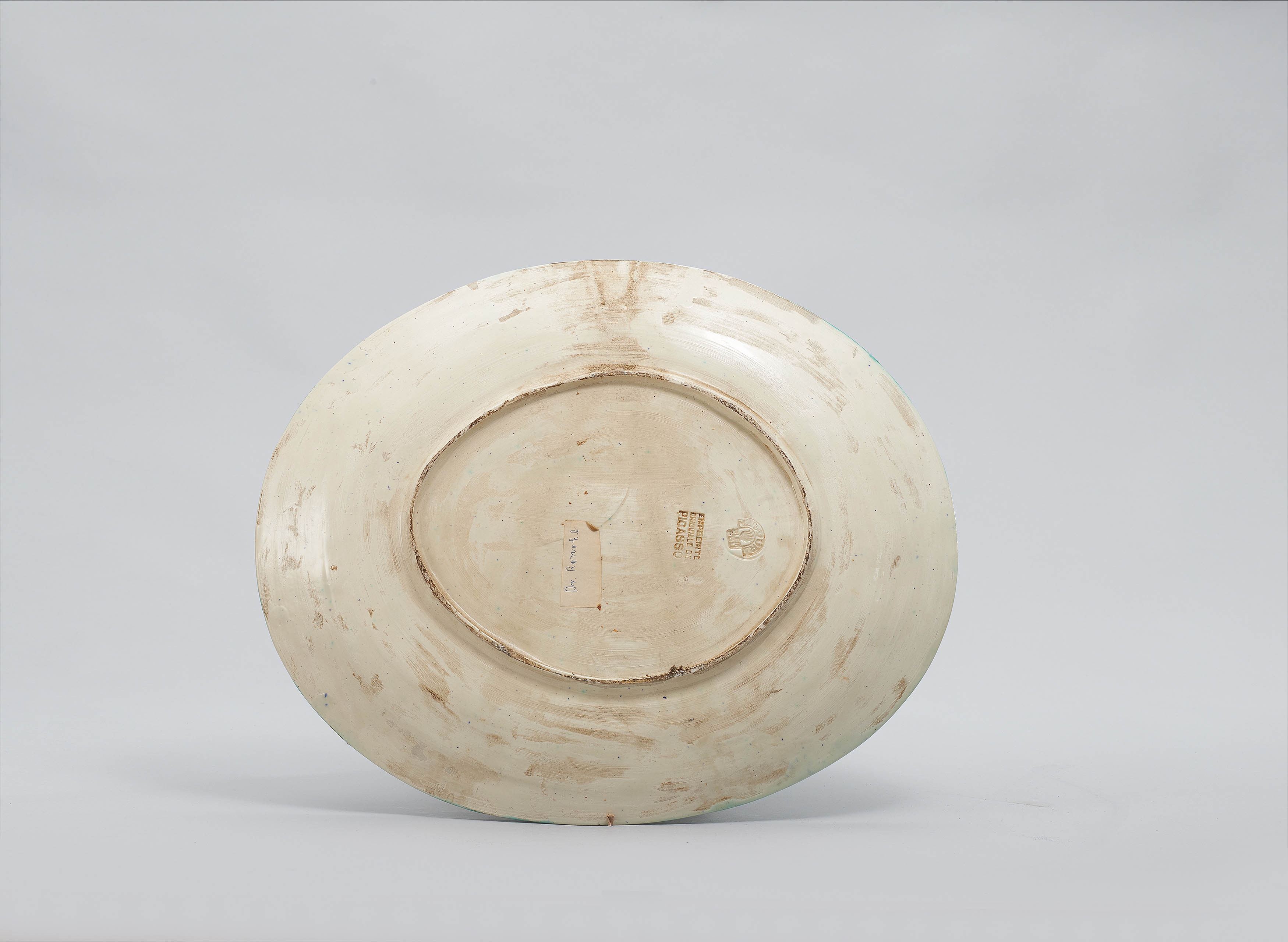 Artwork by Pablo Picasso, Black ground fish., Made of White earthenware, polychromed and partially glazed