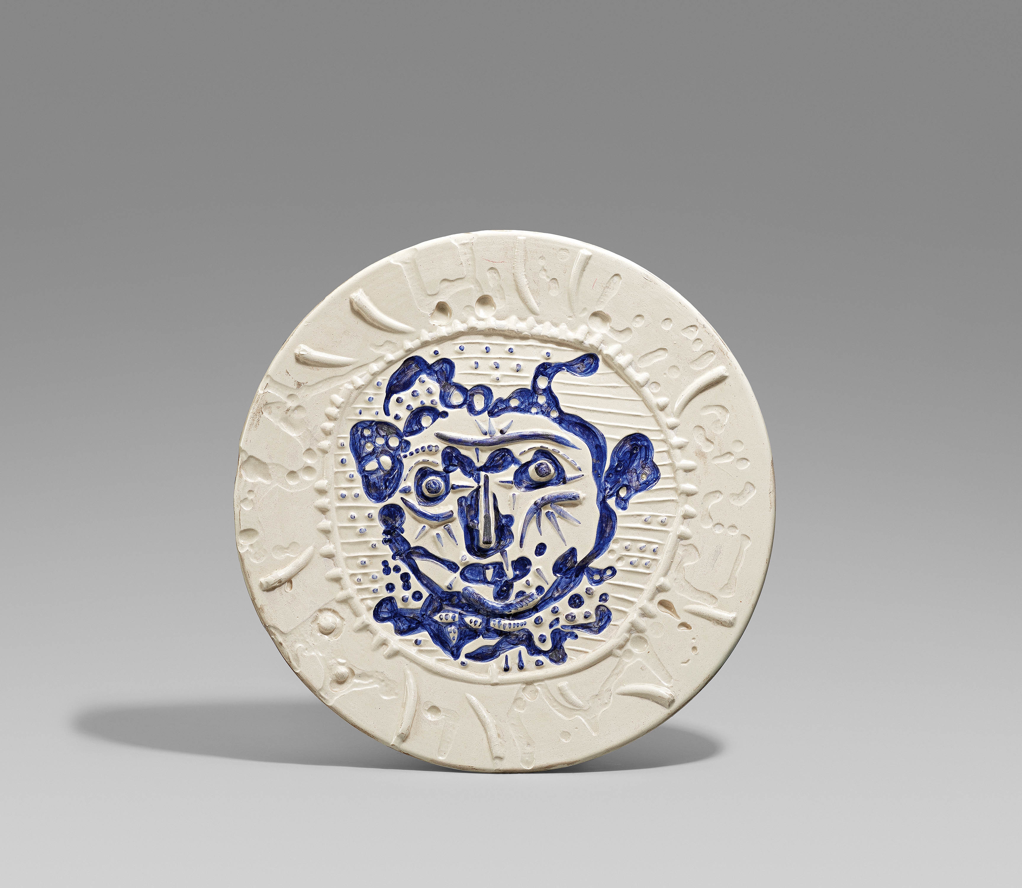 Artwork by Pablo Picasso, Tormented Faun's face., Made of White earthenware, partially polychromed and glazed