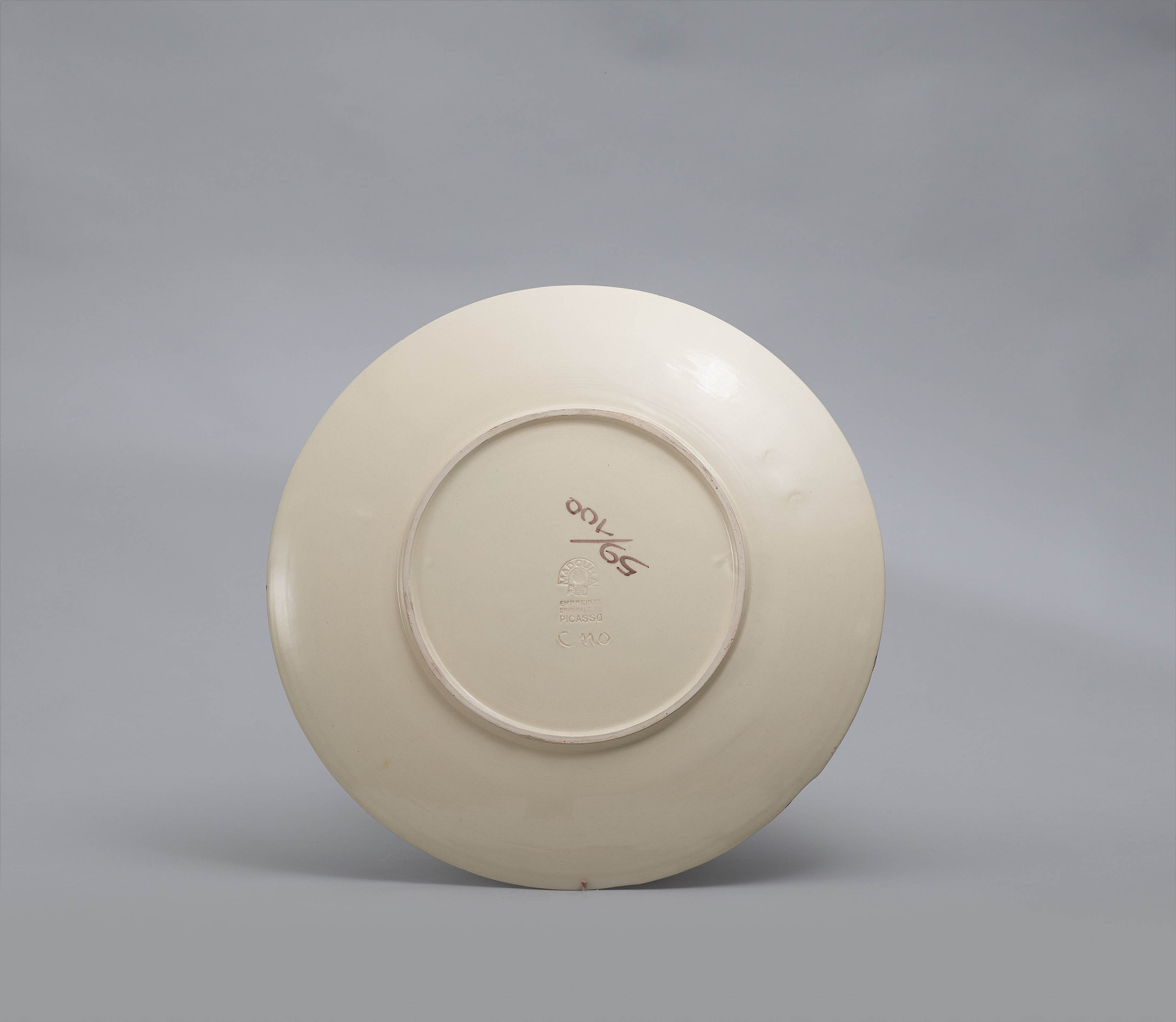 Artwork by Pablo Picasso, Tormented Faun's face., Made of White earthenware, partially polychromed and glazed