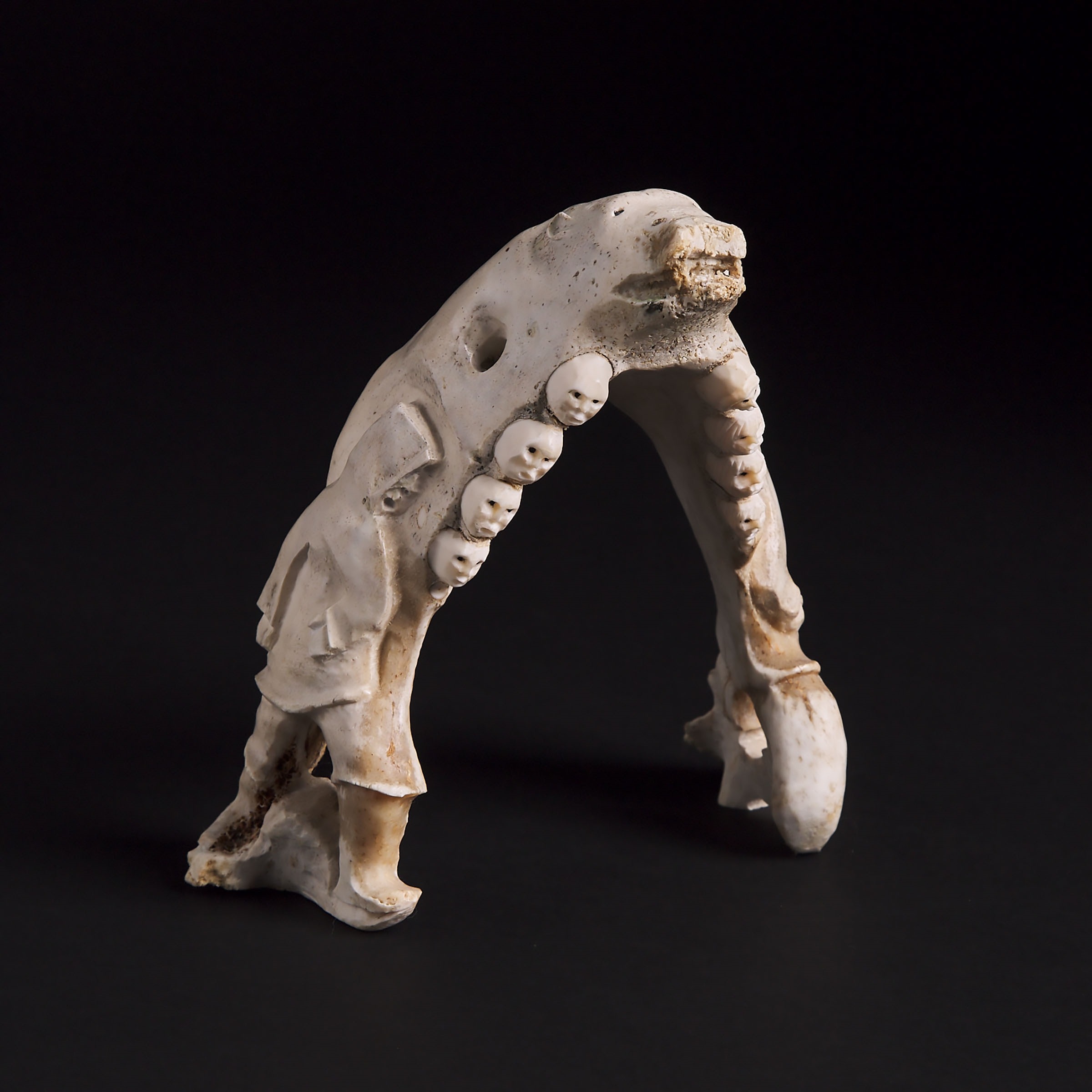 Artwork by Guyasee Veevee, CARVED CARIBOU JAW, Made of bone