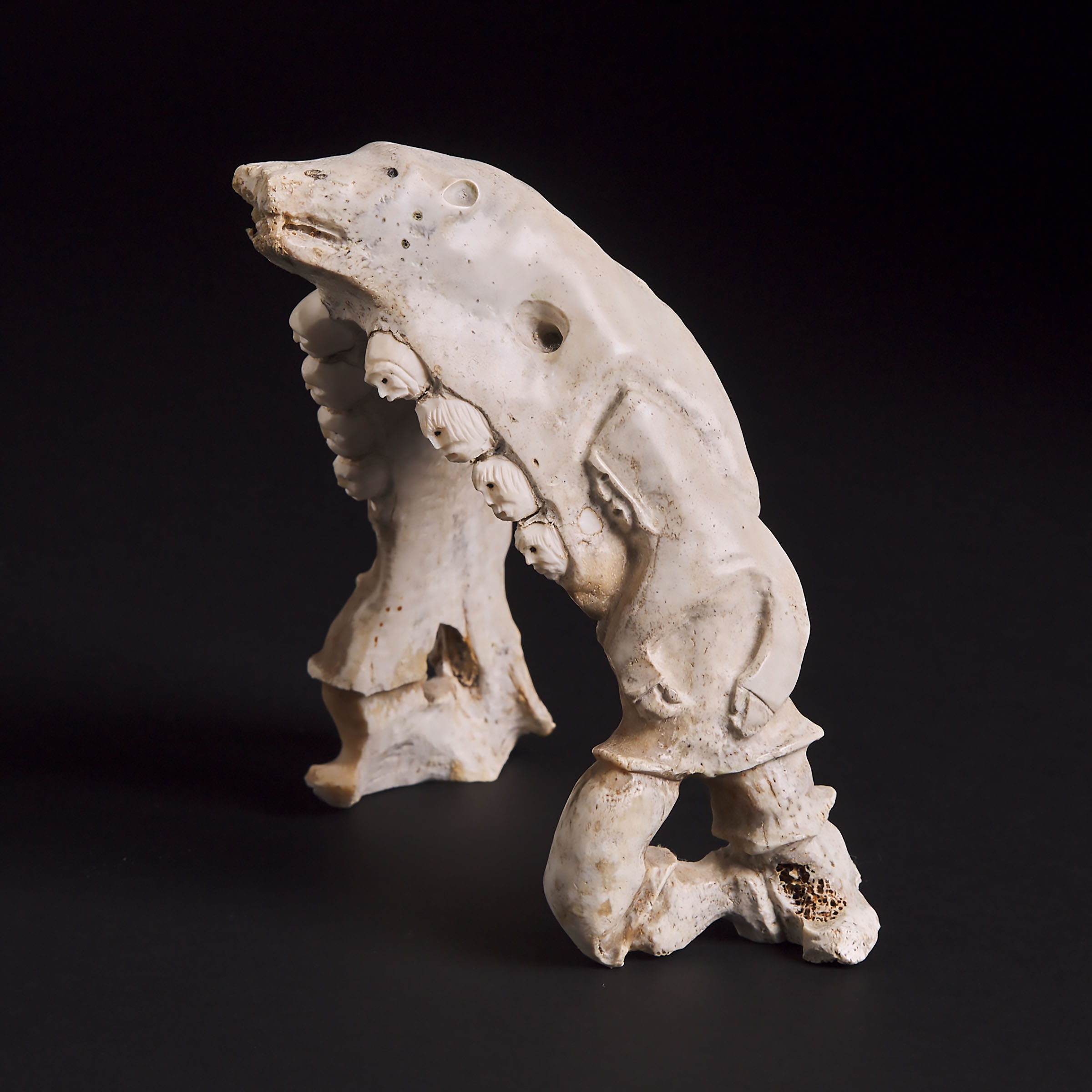 Artwork by Guyasee Veevee, CARVED CARIBOU JAW, Made of bone