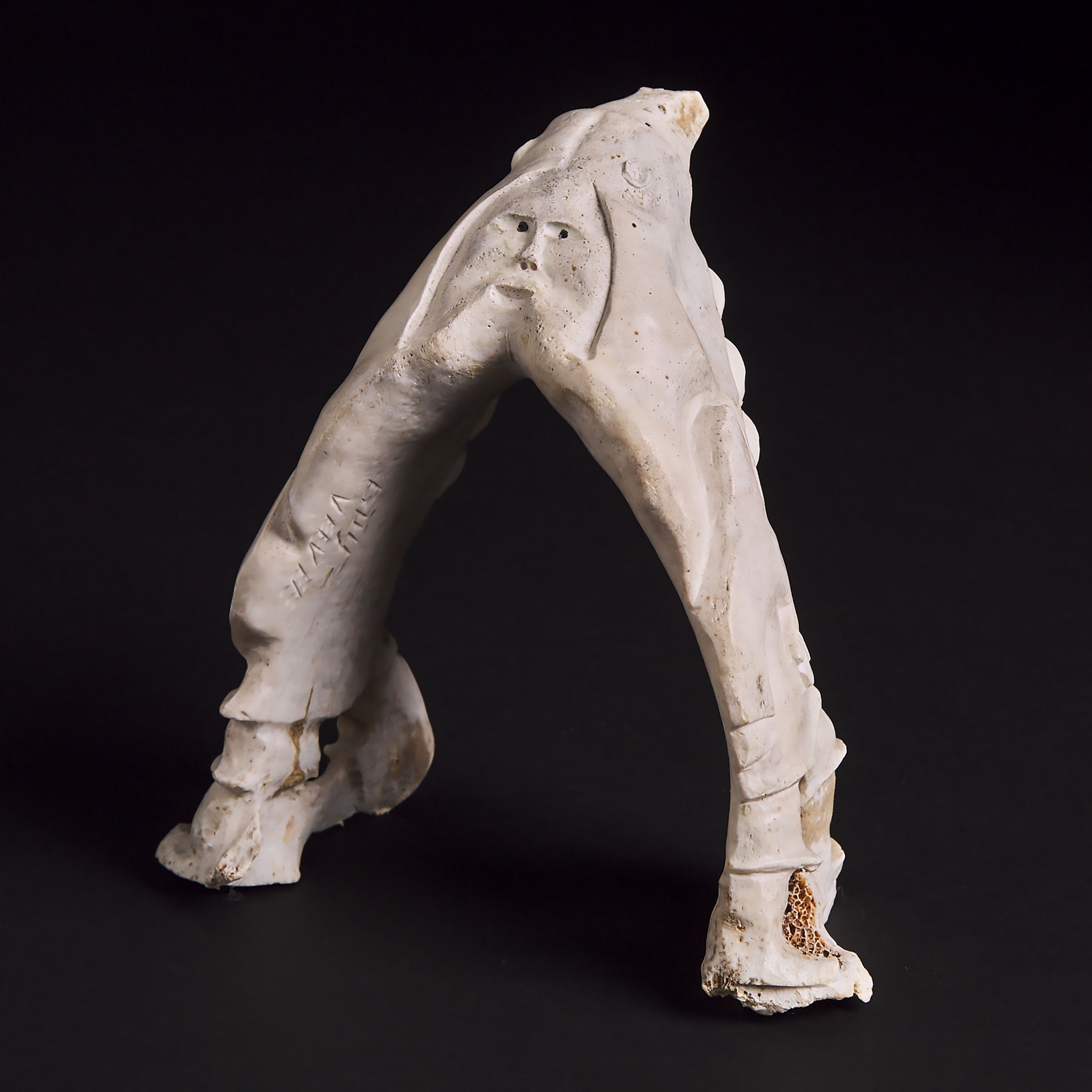 Artwork by Guyasee Veevee, CARVED CARIBOU JAW, Made of bone