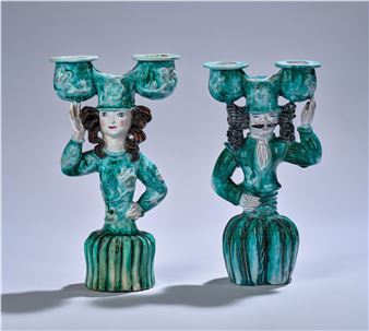 a pair of candleholders with one male and one female figurine - Susi Singer